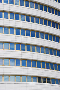 1789318-modern-office-building-background-040214-1185